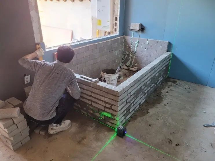 A Bathtub Built Like a Wall: Brick by Brick, Laser Level Running — photo 9