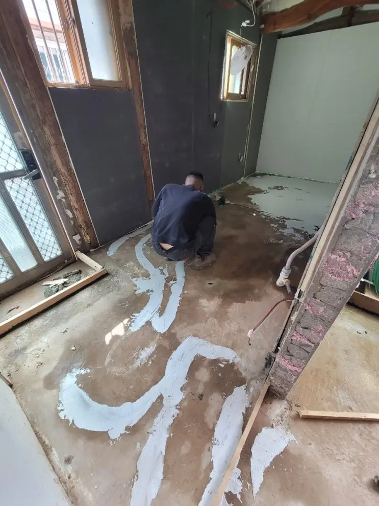Forty Bags of Liquid Floor: The Leveling Pour — photo 4