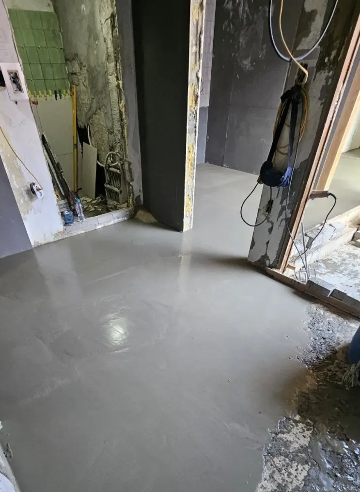 Forty Bags of Liquid Floor: The Leveling Pour — photo 11