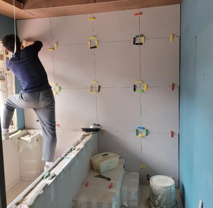 Both Bathrooms Tiled — and Epoxy for the Heavy Ones — photo 9