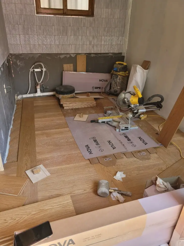 Hardwood Over Red Clay Paste: The Floor Goes In — photo 5
