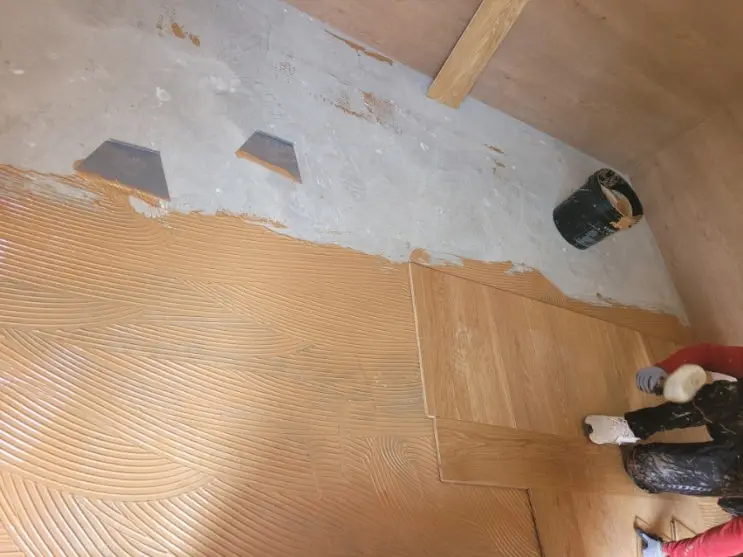 Hardwood Over Red Clay Paste: The Floor Goes In — photo 6