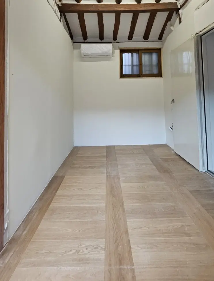 Hardwood Over Red Clay Paste: The Floor Goes In — photo 8